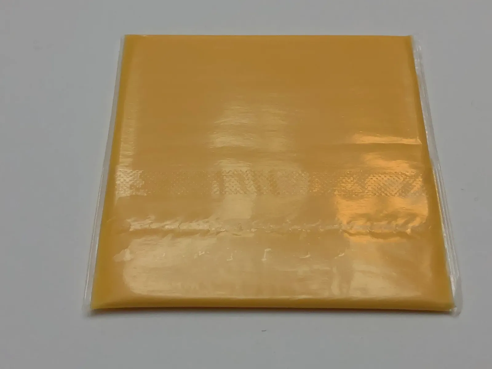 Cheese Needs to Breathe, Not Suffocate in Plastic (Image Credits: Wikimedia)