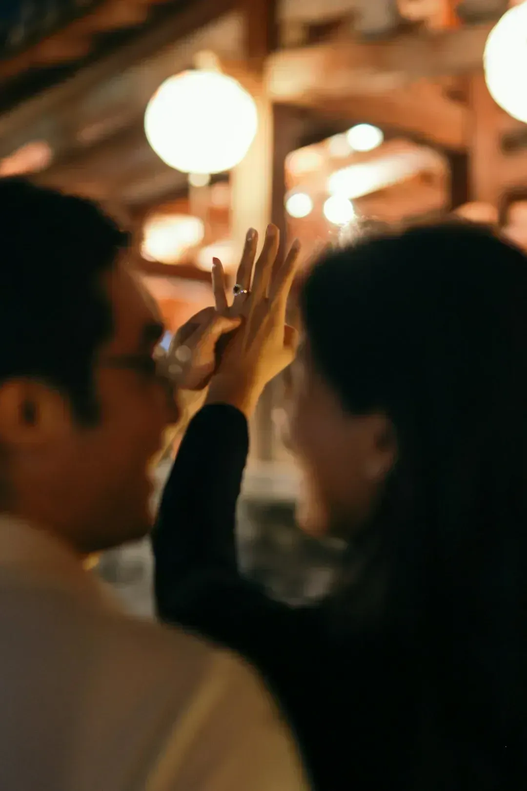 2. Snapping, Tapping, or Whistling to Get Attention (Image Credits: Unsplash)