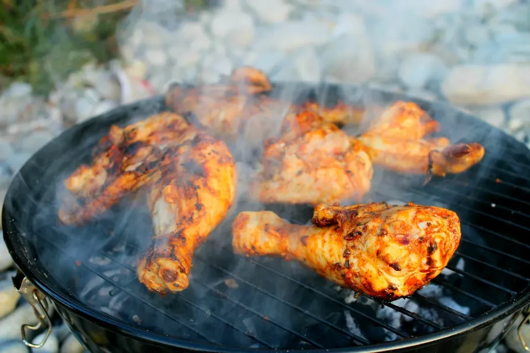 Aries: Smoky Grilled Chicken Thighs With Roasted Peppers (Image Credits: Unsplash)