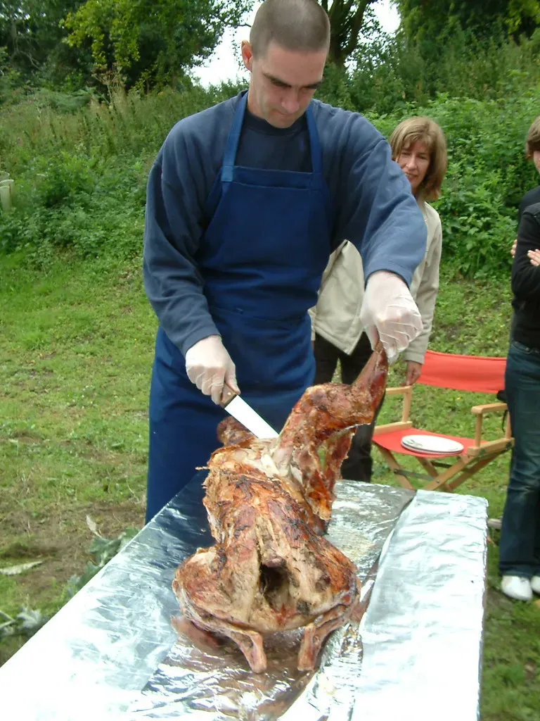 Carving the Roast at the Table (Image Credits: Flickr)