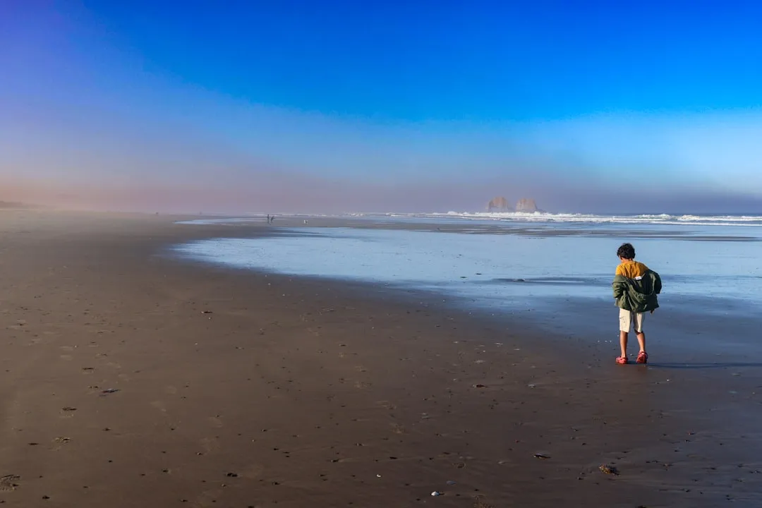 7. Rockaway Beach&rsquo;s Darker Sands, Oregon Coast (Image Credits: Unsplash)