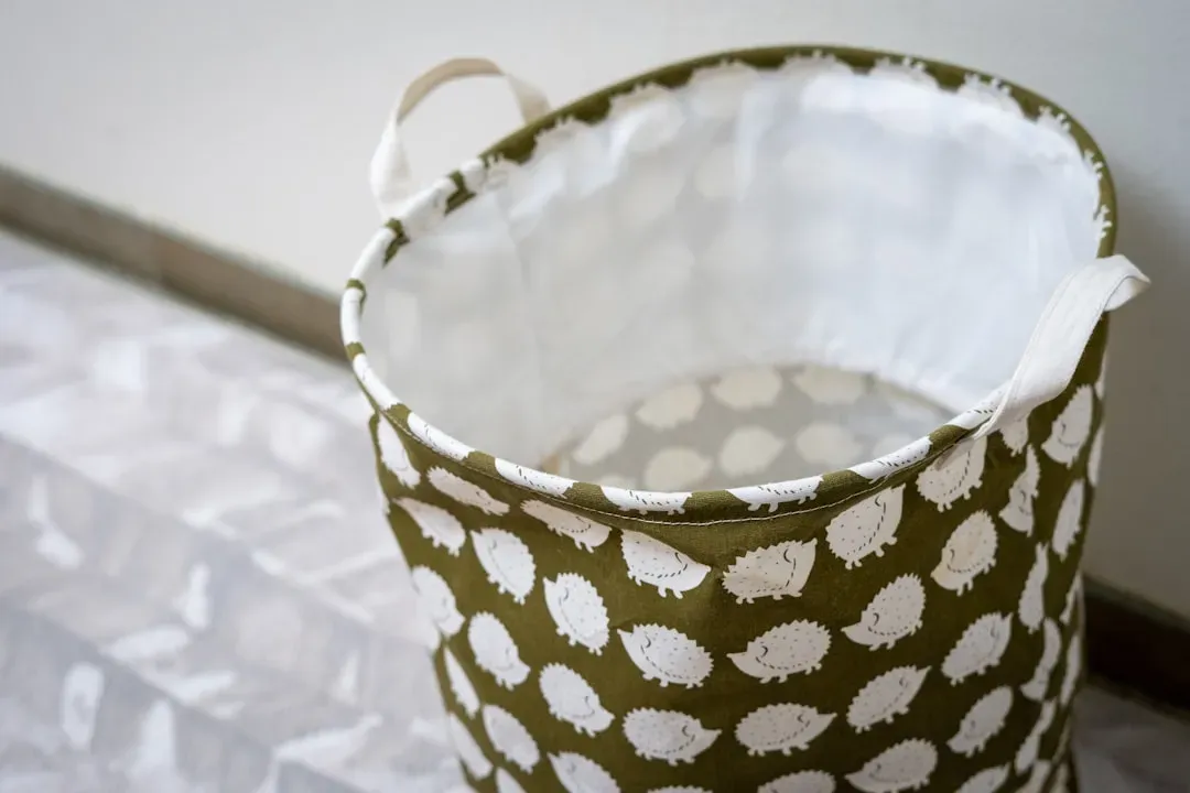 Failing to Inspect and Clean Laundry Hampers (Image Credits: Unsplash)