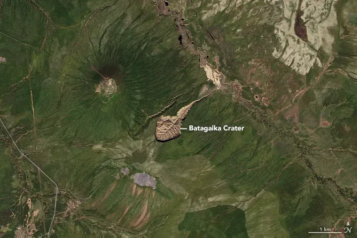 What Exactly Is the Batagaika Crater? (By NASA Earth Observatory images by Jesse Allen, using Landsat data from the U.S. Geological Survey., Public domain)