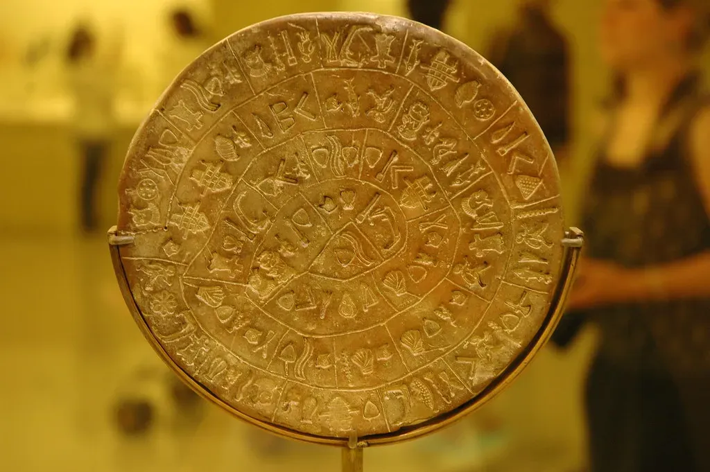 The Phaistos Disk (A Roger Davies, Flickr, CC BY 2.0)