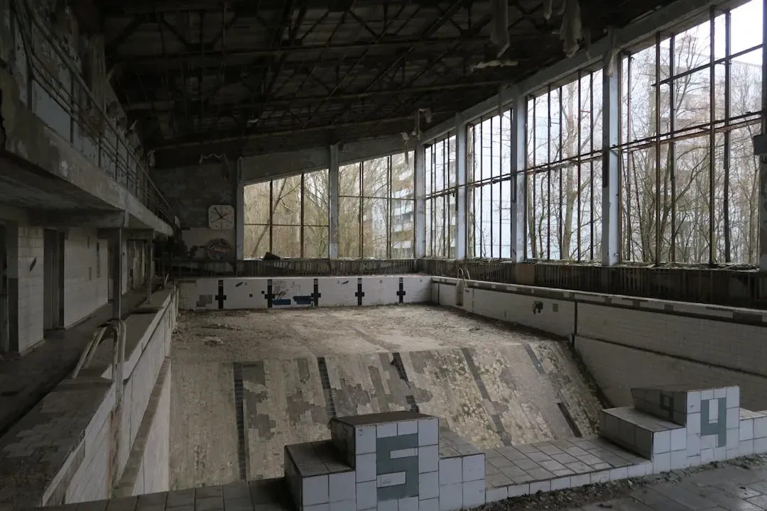 The Overgrown Swimming Pool: Azure in Decay (Image Credits: Unsplash)
