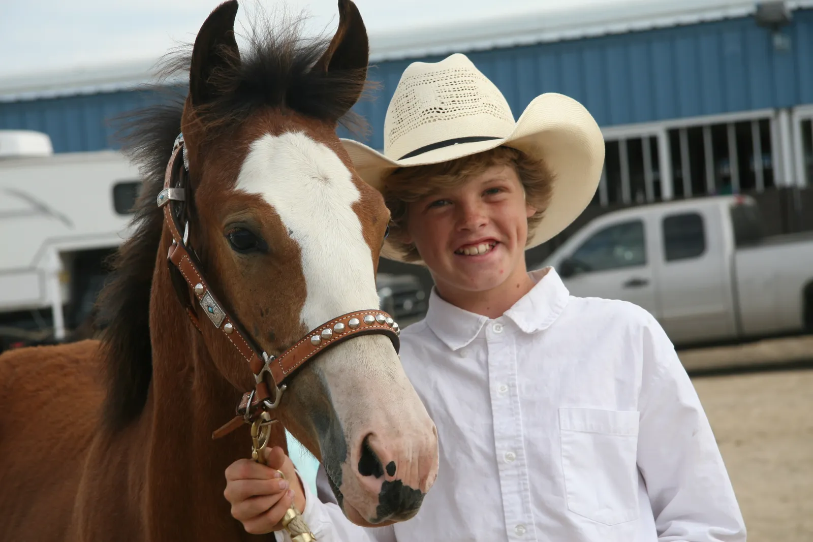 Mustang: The Survivor Who Chooses One Human Carefully (This proud young 4-H member gentled and trained his weanling mustang for the 2011 Western Idaho State Fair., Public domain)