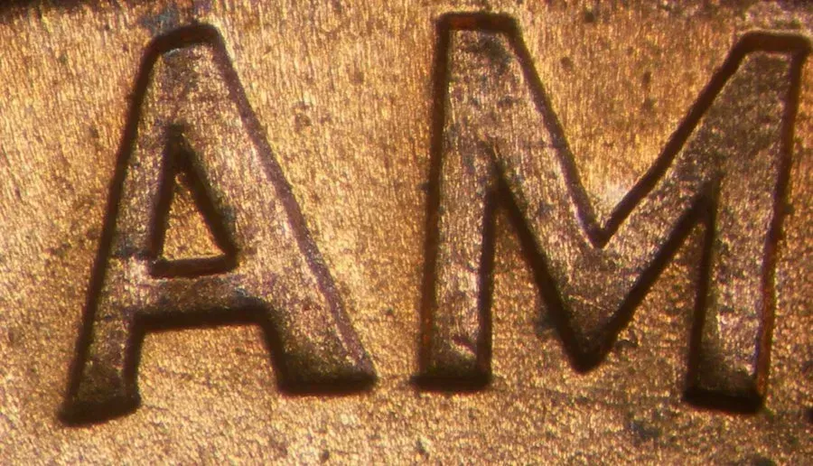 1999 Wide AM Reverse Penny: The Spacing Error (Image Credits: By Contactsmc, CC BY-SA 3.0, https://commons.wikimedia.org/w/index.php?curid=25747903)