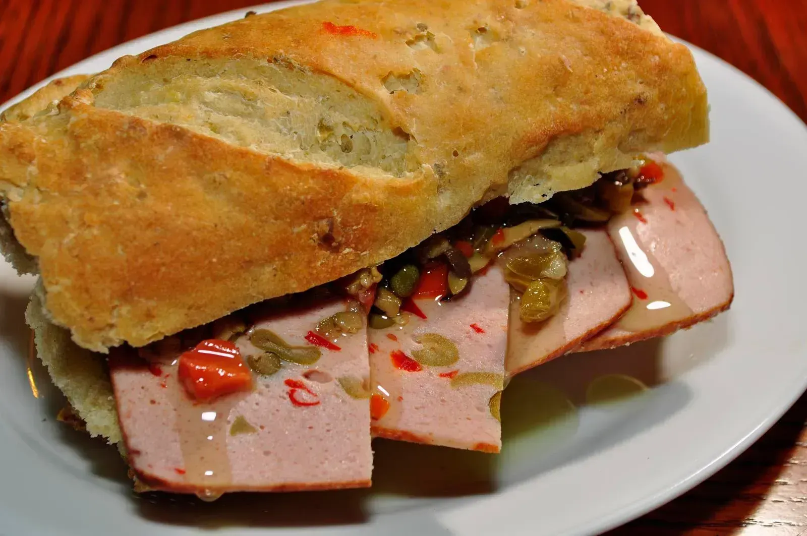 Olive Loaf on White Bread (Image Credits: Wikimedia)