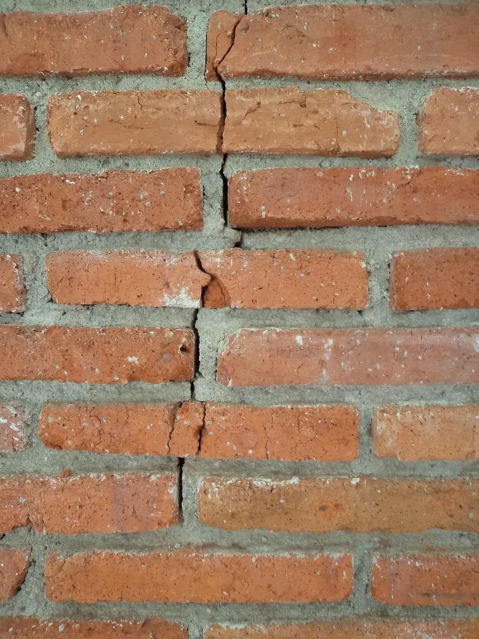 Exterior Cracks in Concrete or Brick That Follow Unusual Angles (Image Credits: Pixabay)