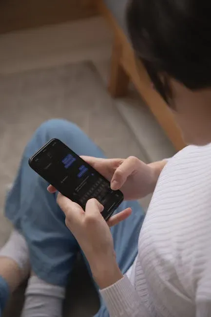 2. Checking the Phone Constantly During the Interaction (Image Credits: Pexels)