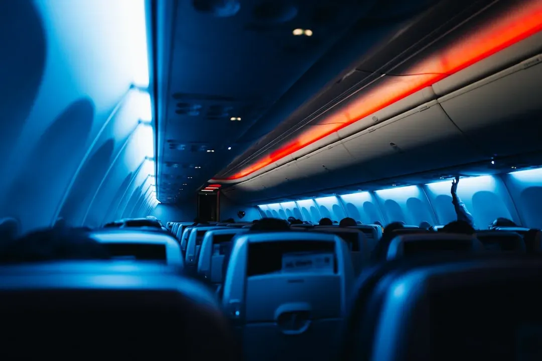 5. Store Your Luggage Correctly and Sit in Your Assigned Seat (Image Credits: Unsplash)