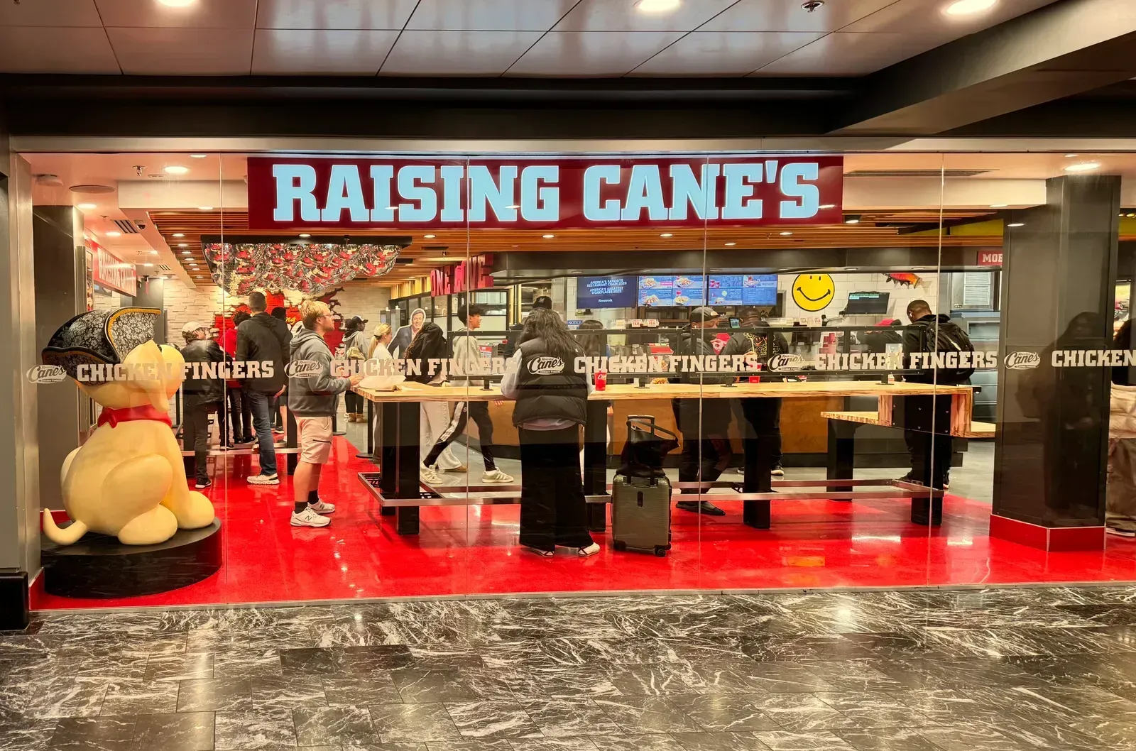 3. Raising Cane's: Fresh Tenders and Handmade Sauce Before Opening Time (Image Credits: By Harrison Keely, CC BY 4.0)