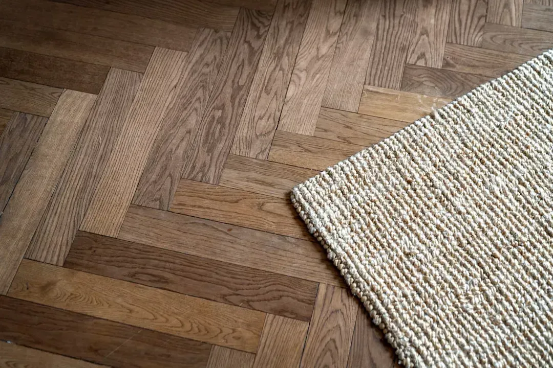 9. New Carpet Over Hardwood Floors (Image Credits: Unsplash)