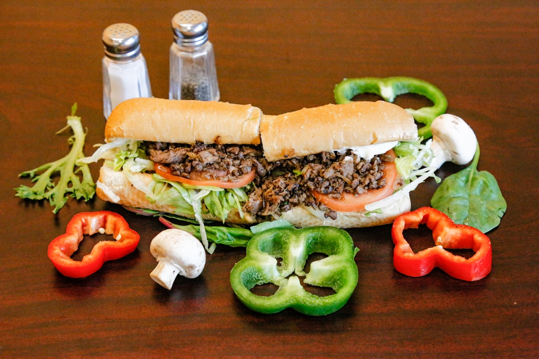 Cheez Whiz on Cheesesteaks (Image Credits: Unsplash)