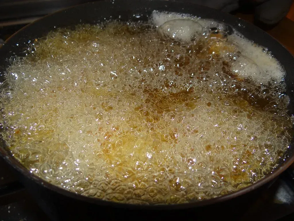 Those Screaming-Hot Pans Are the Real Secret (Image Credits: Flickr)
