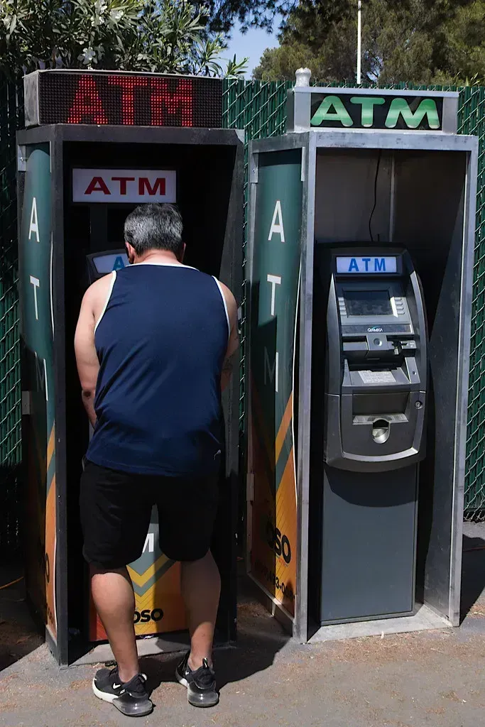 7. Unnecessary Banking and ATM Fees (A Guy Named Nyal, Flickr, CC BY-SA 2.0)