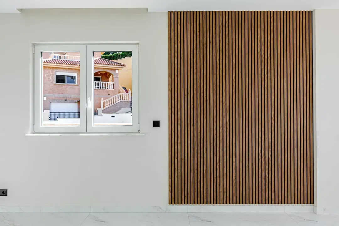 Slatted Wood Accent Walls (Image Credits: Unsplash)