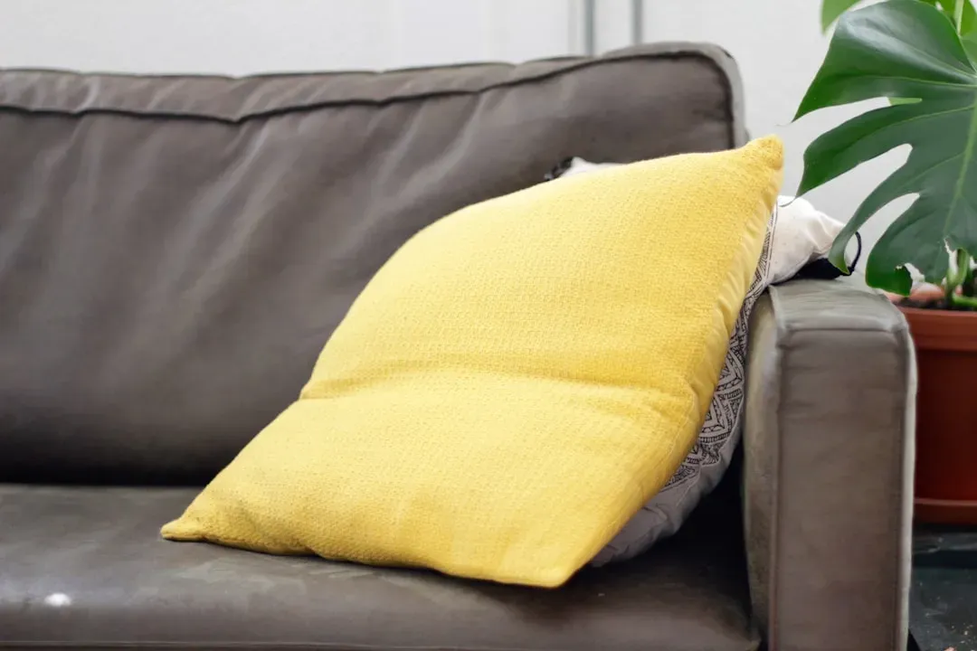 4. Pillows Look Yellow or Feel Lumpy (Image Credits: Unsplash)