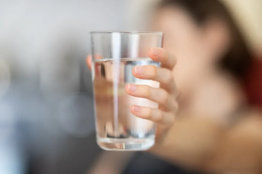 Drinking enough water throughout the day (Image Credits: Unsplash)