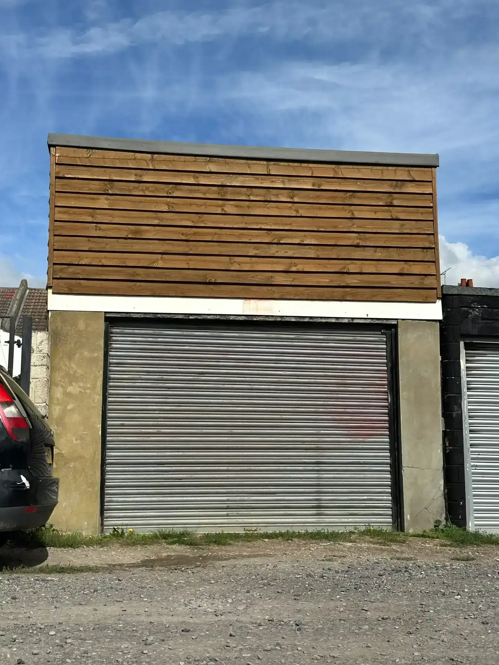 1. Garage Door Replacement (Image Credits: Wikimedia)