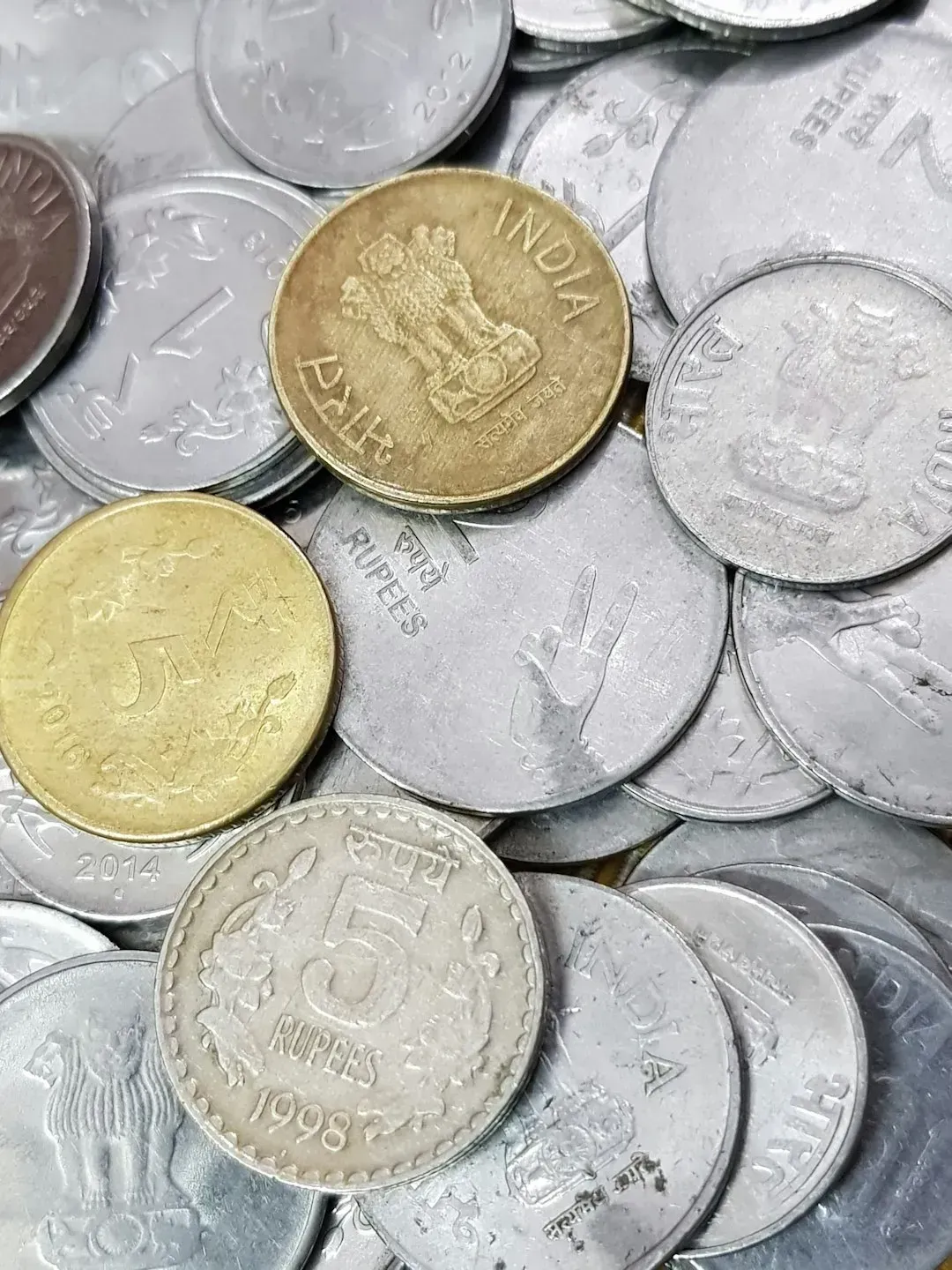 5. Cash and Coins (Image Credits: Unsplash)