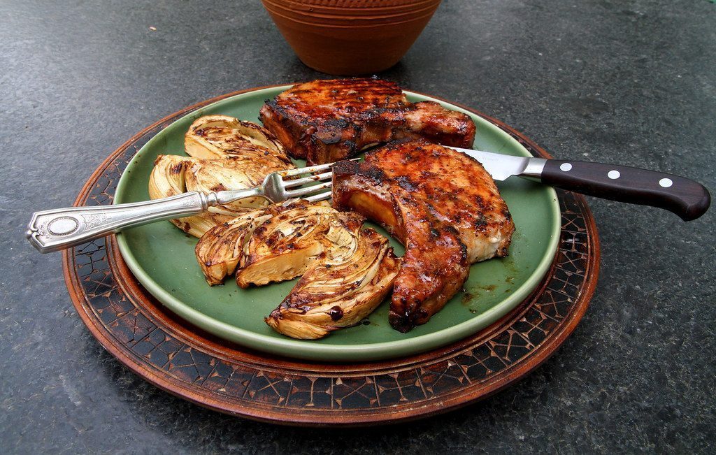 7. Pork Chops with Fruit Glaze (Image Credits: Flickr)