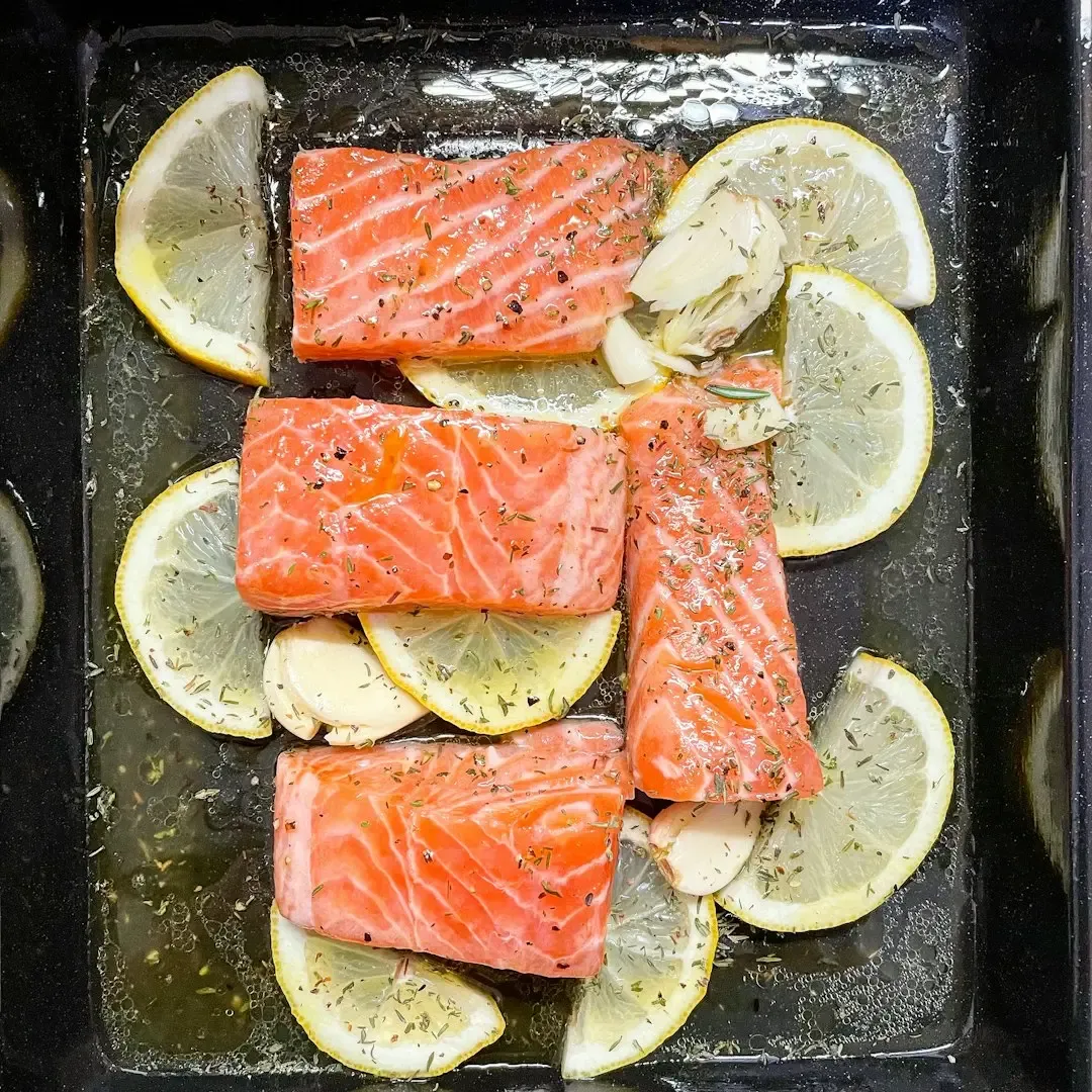 Salmon with broccoli and lemon (Image Credits: Unsplash)