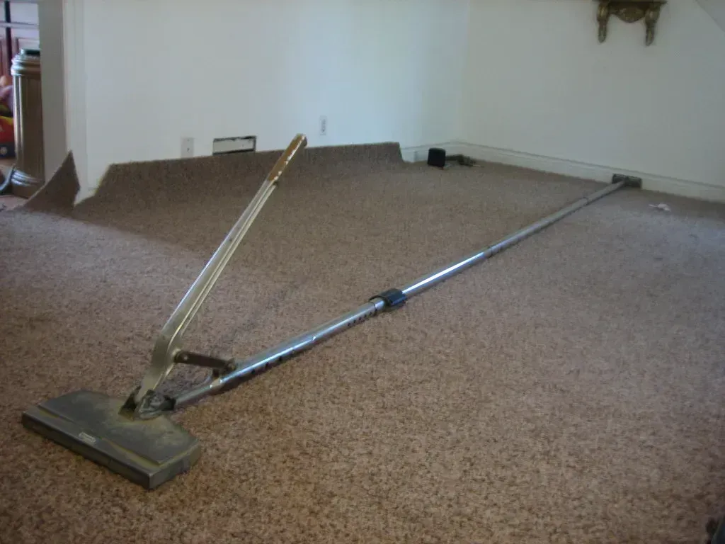 2. Installing Wall-to-Wall Carpeting (Image Credits: Flickr)
