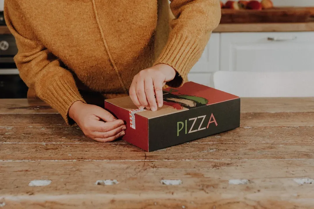 2. Greasy Pizza Boxes (Image Credits: Unsplash)