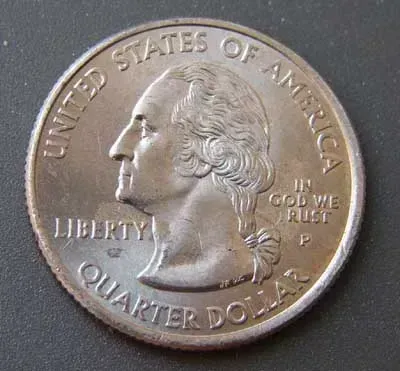 Kansas “In God We Rust” Quarter (2005-P) – Missing Letter, Extra Value (Image Credits: Wikimedia)