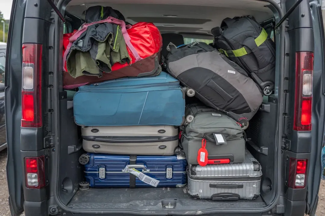 2. Packing a Chaotic, Overstuffed Carry-On Bag (Image Credits: Unsplash)