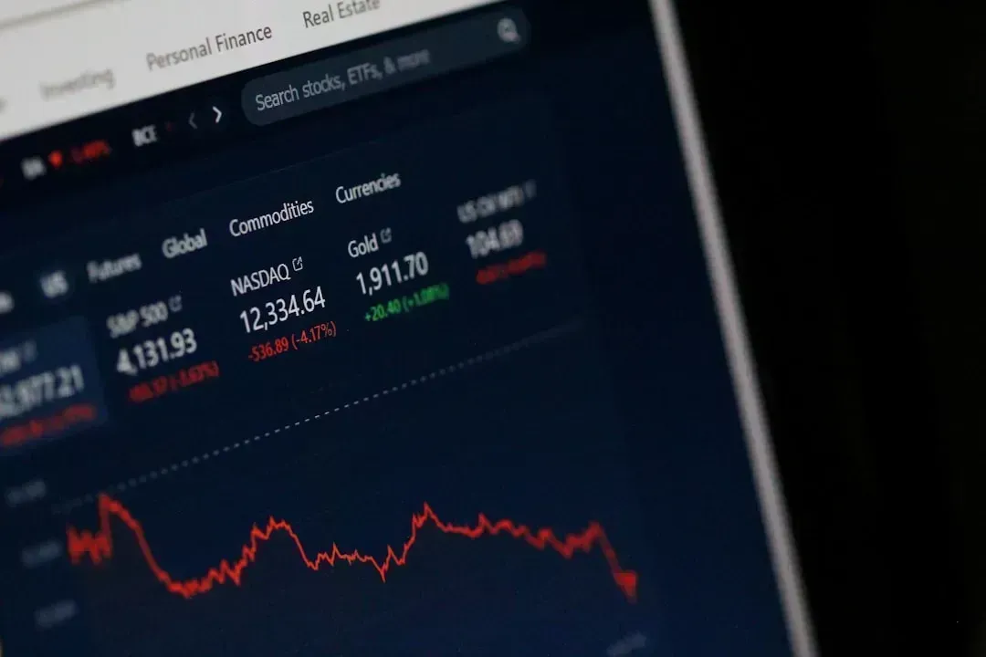 5. Review and Rebalance Your Investment Portfolio Regularly (Image Credits: Unsplash)