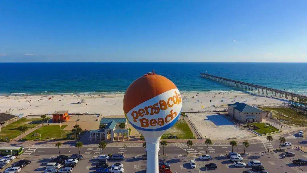 6. Pensacola - White Sand Beaches Without the White Sand Price (Image Credits: Unsplash)