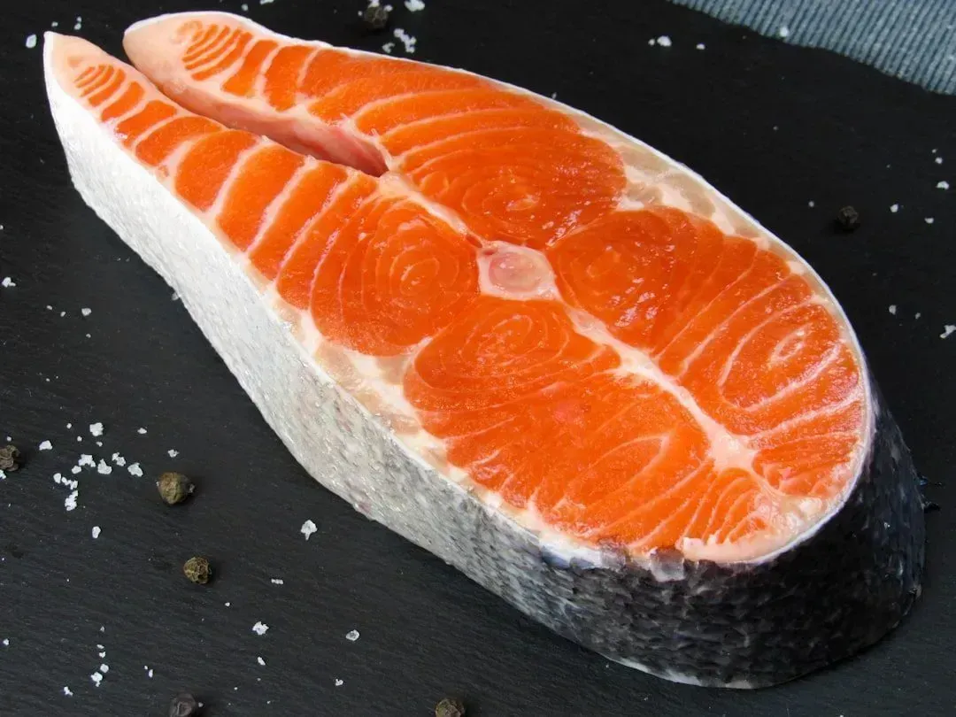 Farm-Raised Salmon Pumped with Synthetic Astaxanthin (Image Credits: Unsplash)