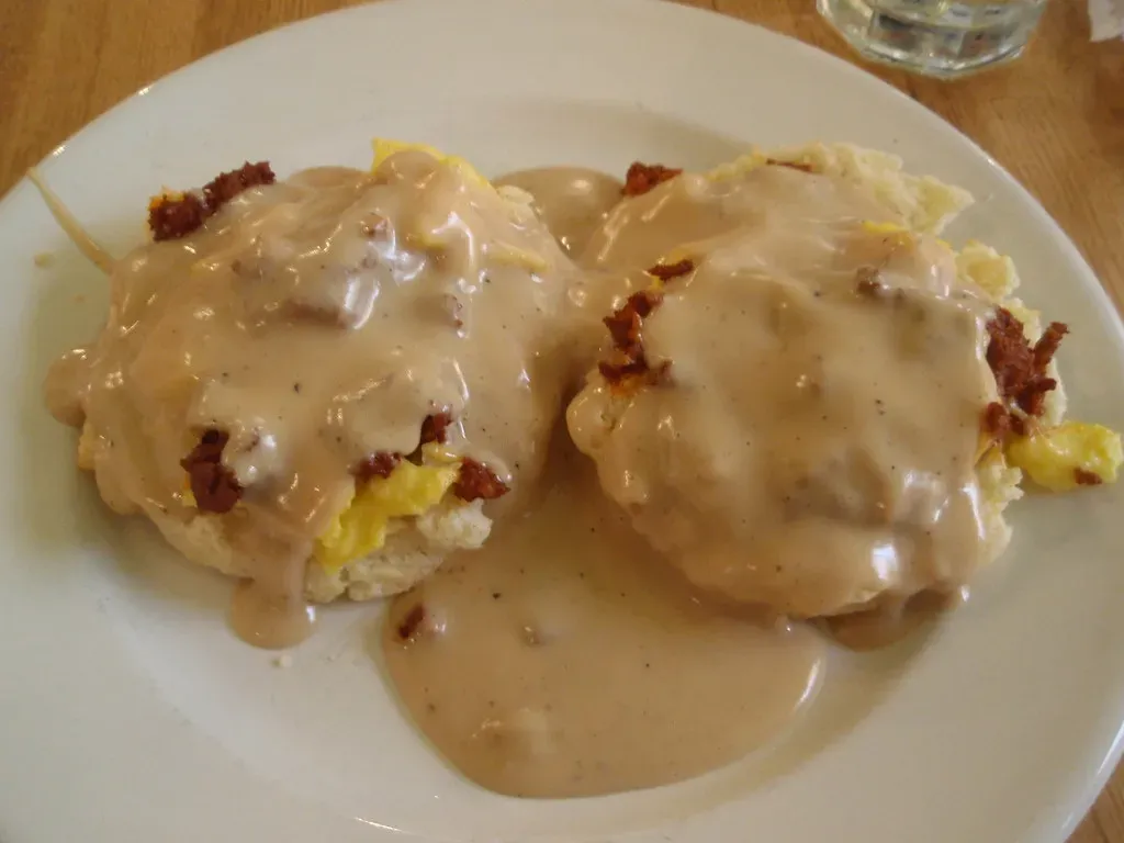Tomato Gravy Over Hot Biscuits (Image Credits: Flickr)