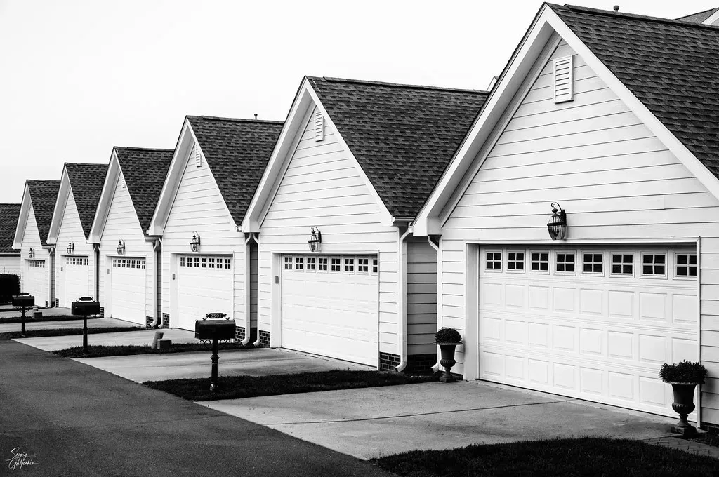 Three-Car Garages in Standard Suburban Homes (Image Credits: Flickr)