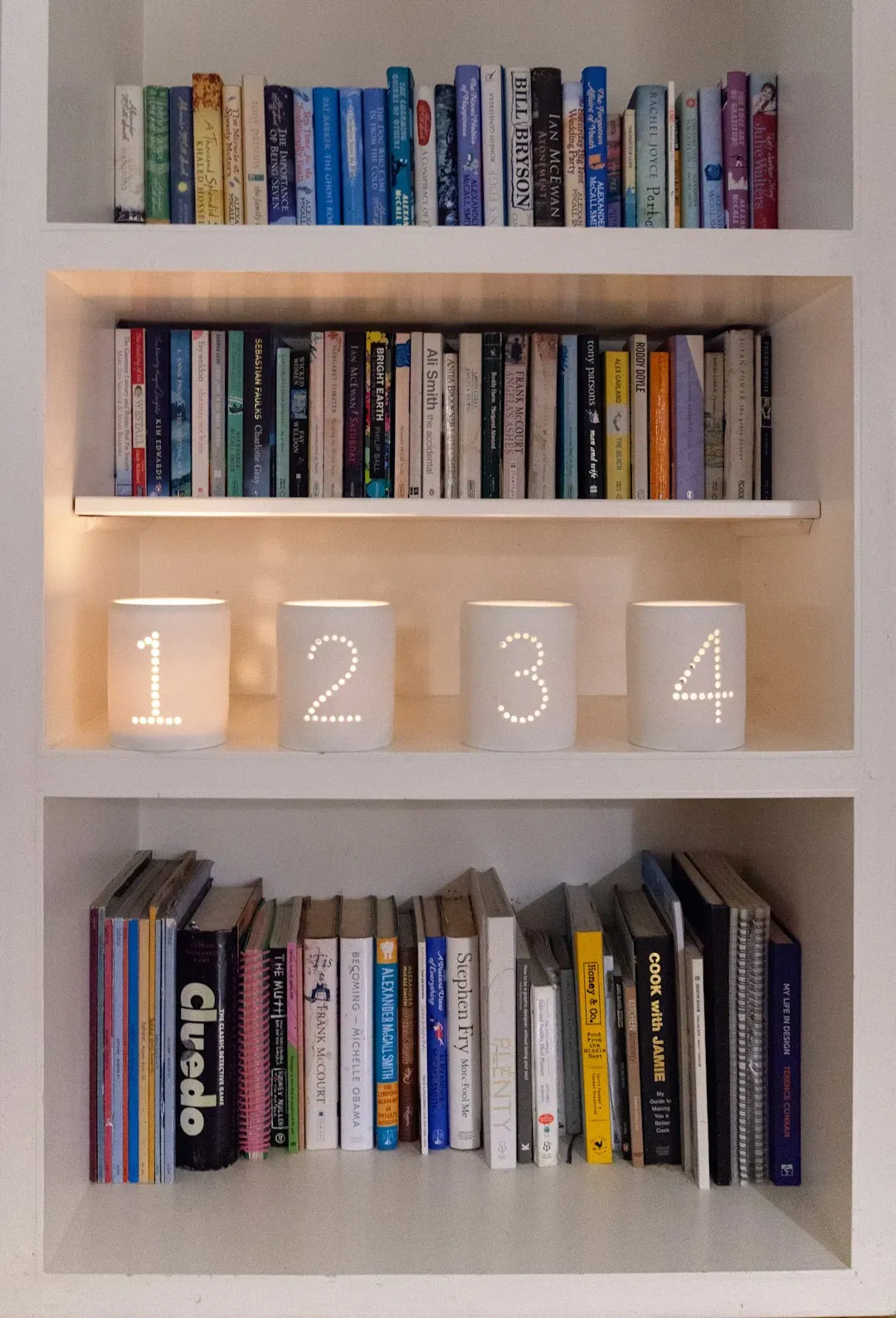 Open Shelving Packed With Items (Image Credits: Unsplash)