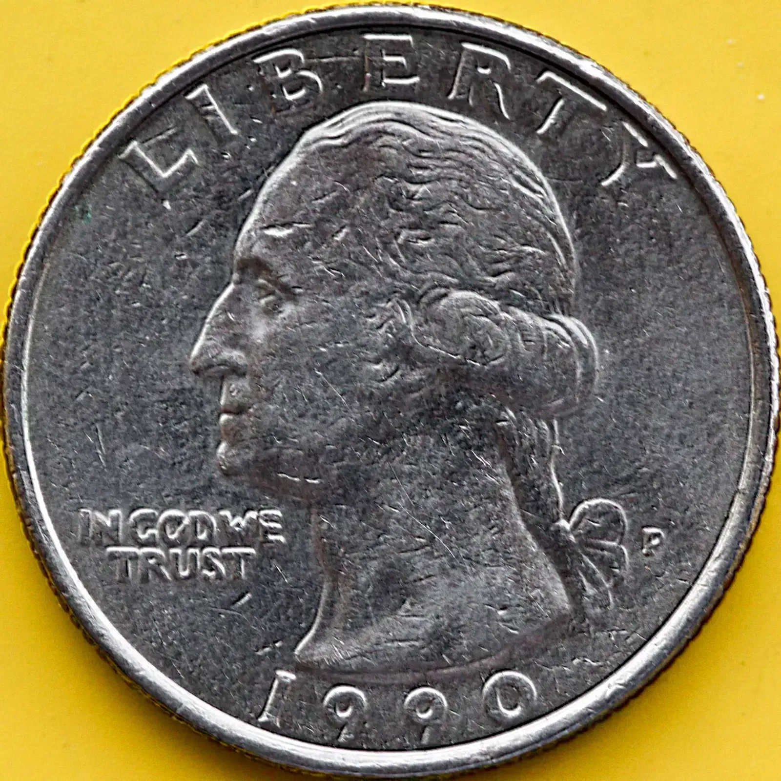1990 High-Grade Washington Quarter (Image Credits: 1990 US Quarter Washington Head Philadelphia Mint, CC BY 2.0, https://commons.wikimedia.org/w/index.php?curid=67300296)