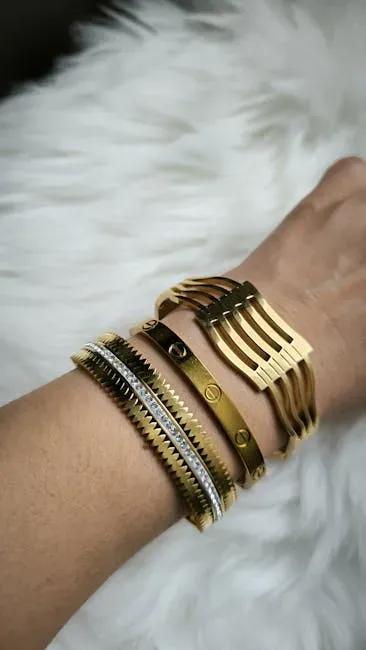 7. Elaborate Metal Jewelry Stacks (Image Credits: Pexels)