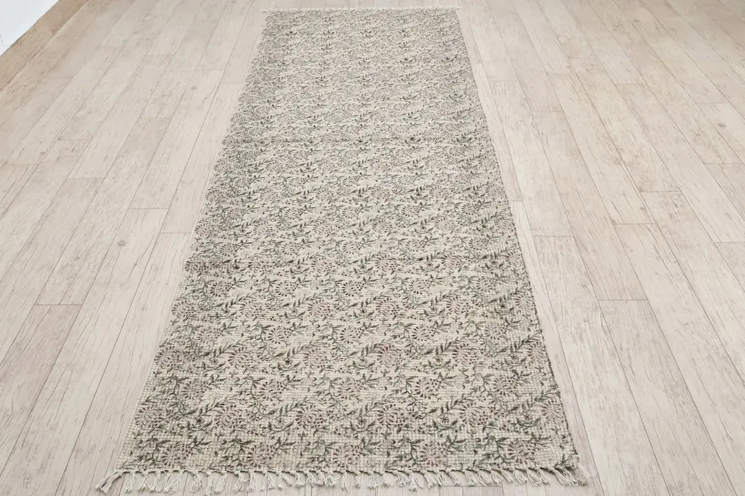 Rugs and runners for texture and safety (Image Credits: Unsplash)