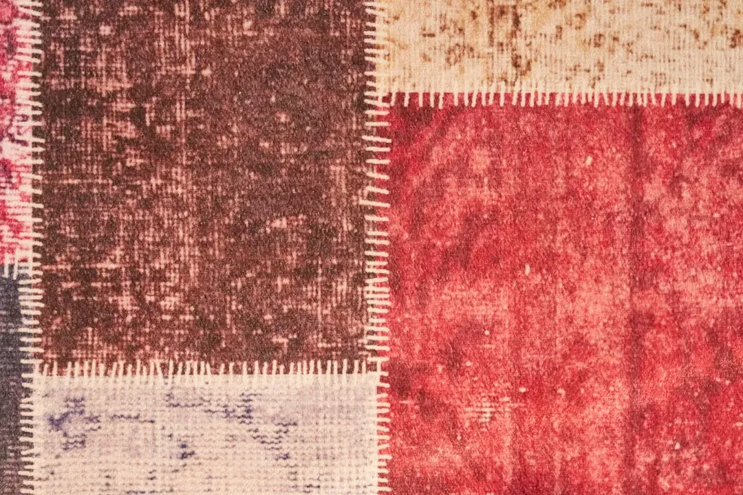 Adding warmth with textiles and rugs (Image Credits: Unsplash)