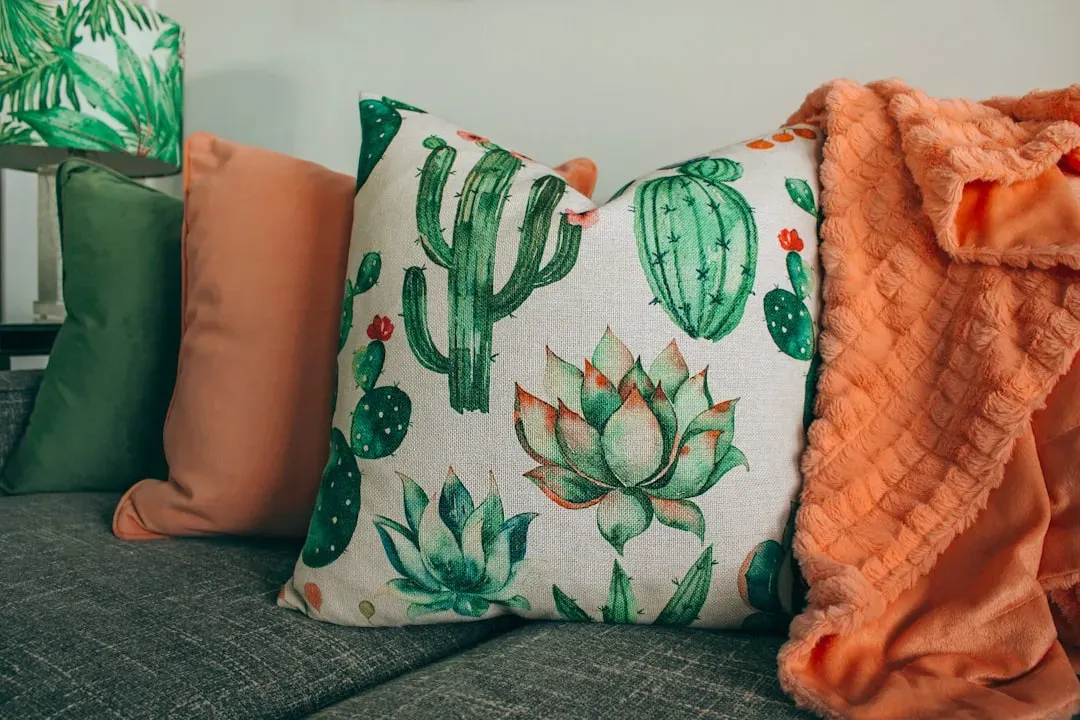 3. Layer different textures with throw pillows and blankets (Image Credits: Unsplash)