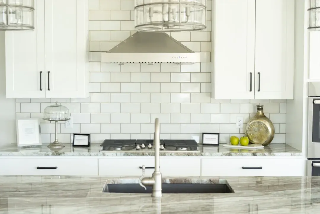 Try Large-Format Tiles on the Backsplash or Floor (Image Credits: Unsplash)
