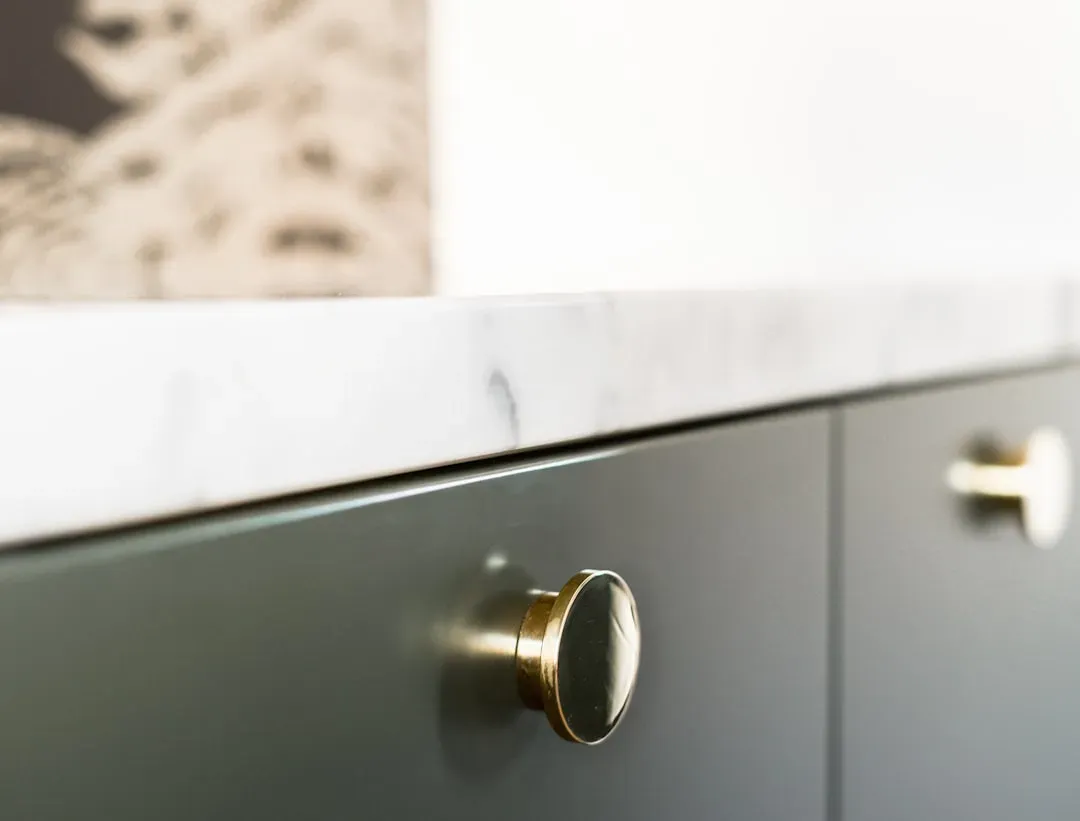 Update hardware on cabinets and doors (Image Credits: Unsplash)