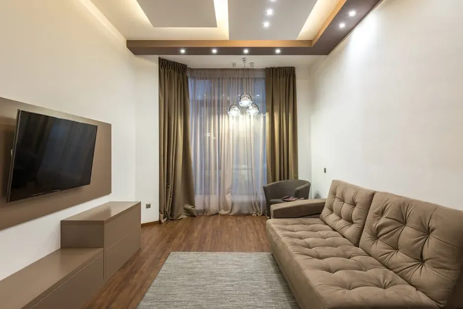 Hang Curtains from Ceiling Height (Image Credits: Pexels)
