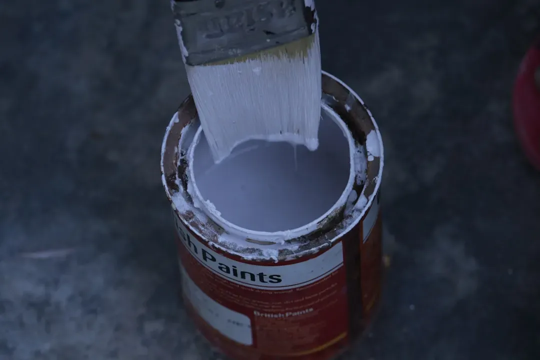 Old Paint Cans Taking Up Prime Shelf Space (Image Credits: Unsplash)