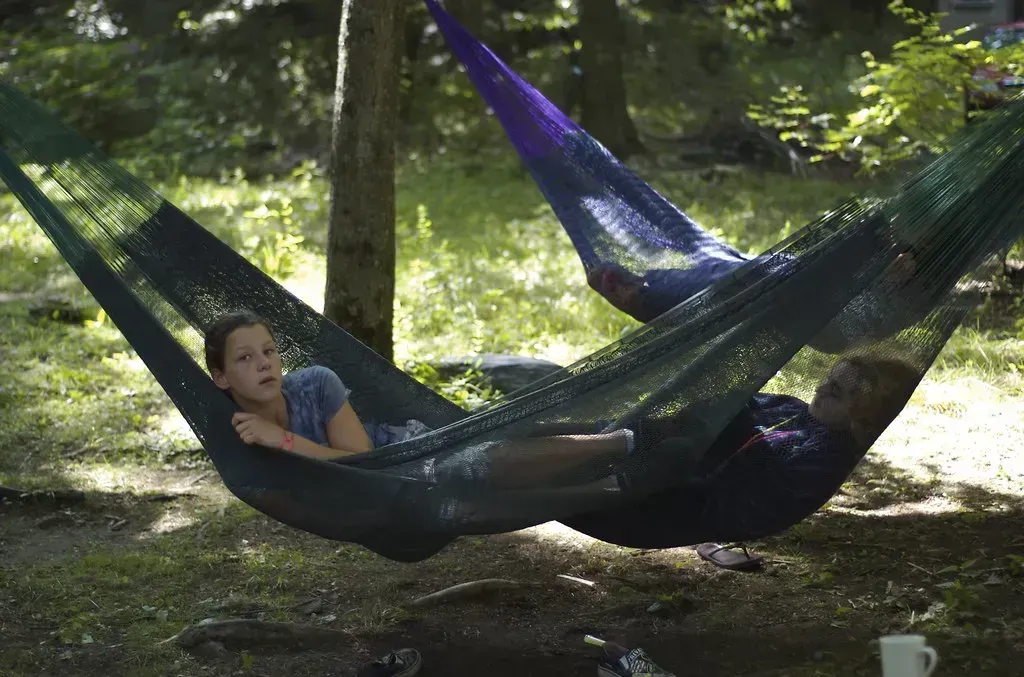 A hammock strung between two posts (Tim Pierce, Flickr, CC BY 2.0)
