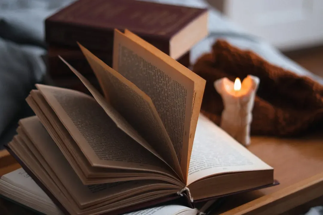 Curate a stack of books, shows, or games without pressure (Image Credits: Unsplash)