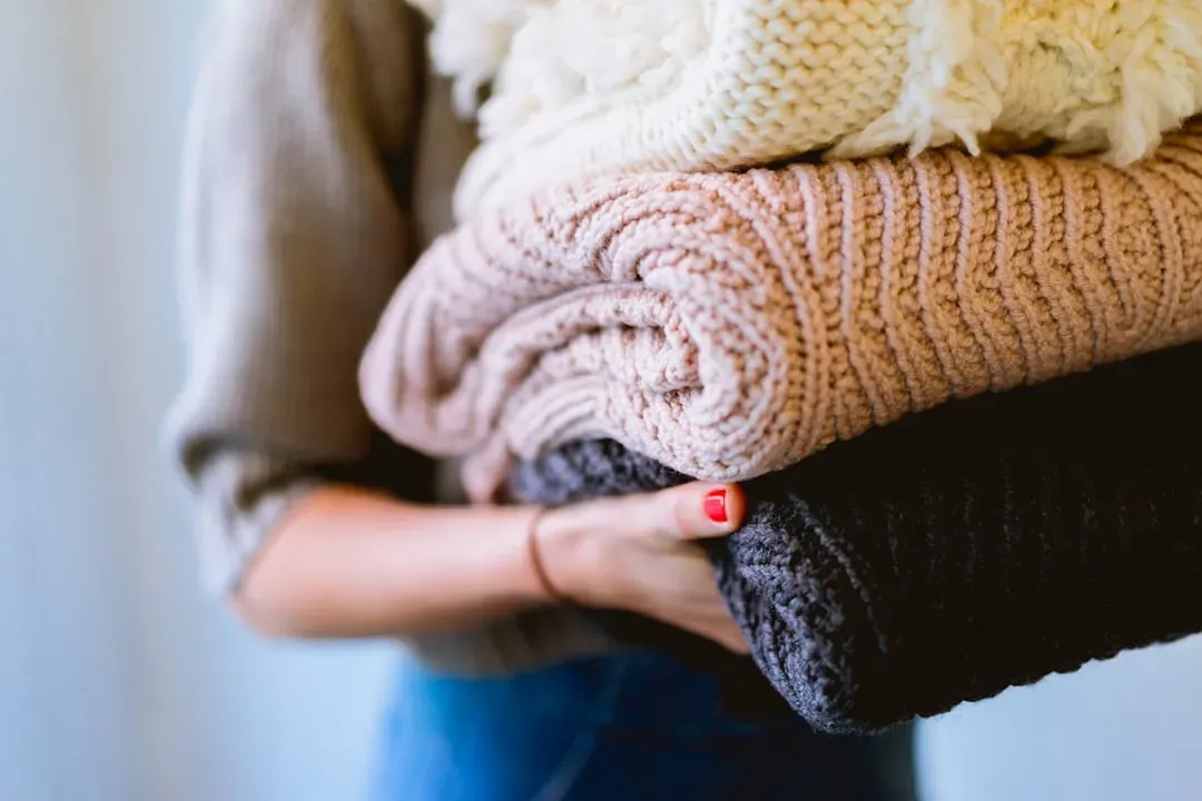 Cozy dressing has moved off the couch and into daily life (Image Credits: Unsplash)