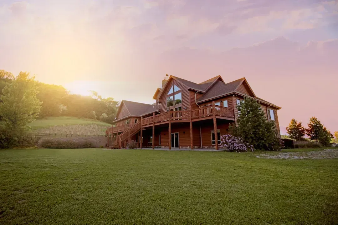 Timber homes that age like the forest around them (Image Credits: Unsplash)